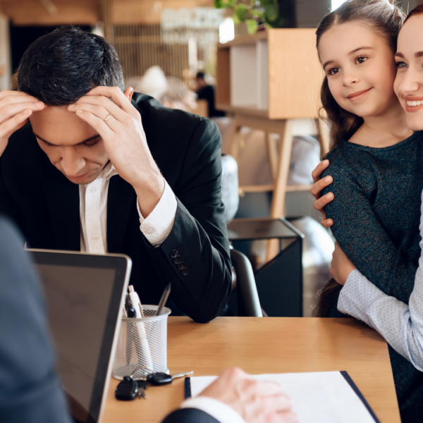 child holding mother and dad stressed out